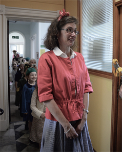 Miss Kinley Leads The Young Evacuees Out Of Melrose